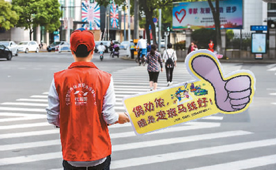 “中国式过马路”死结怎么解：红灯管不住 曝光惹争议 