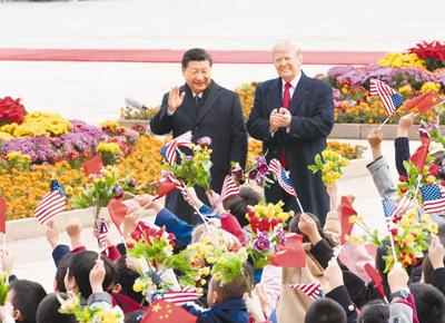 习近平同美国总统特朗普举行会谈 推动中美关系得到更大发展