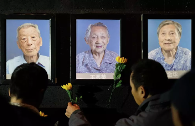 南京大屠杀国家公祭日：遇难同胞照片墙灯又灭三盏