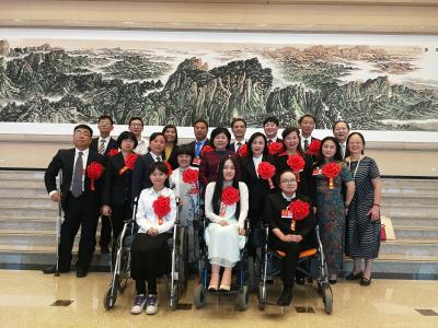 全国自强模范 助残先进载誉归来