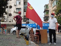 郧阳：党旗飘扬战疫情