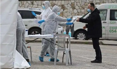 以色列累计新冠死亡病例过万 3月起全面开放边境 