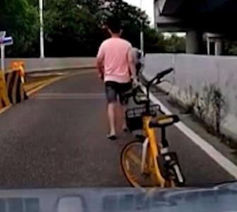 男子不满后车按喇叭将单车锁路中间引热议：干的漂亮还是没素质？