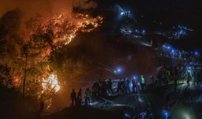 摄影师：“灾难片里都是逃跑，但重庆人却向着山火跑”