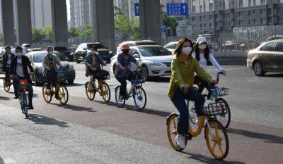 人民日报：营造方便市民骑行的环境