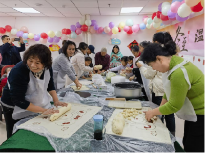 春风里社区：饺香暖冬行，温情溢社区