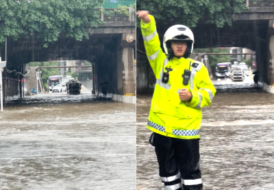 武汉梅家山立交涵洞积水40厘米 交警现场紧急疏导过往车辆