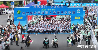 第六届全国肢残人轮椅马拉松赛在湖北荆门举行