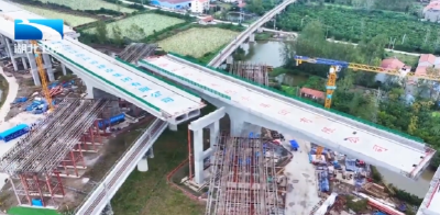 双柳长江大桥接线工程完成双向转体 新港高速明年建成通车