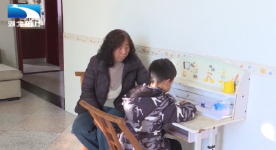 余春华：跨越血缘的亲情 用爱为孩子撑起温暖家