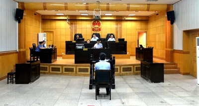 法检两长同出庭  案件审理共出力