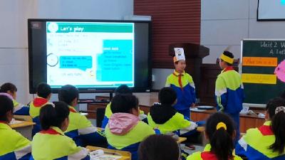 房县小学英语送教下乡培训活动在军店小学举行 