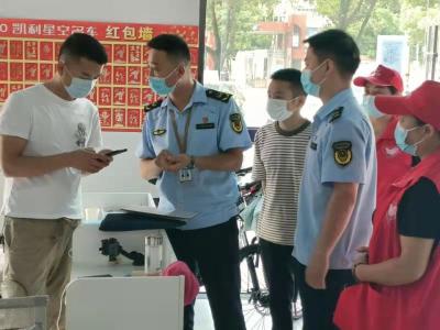 房县开展疫情防控志愿服务宣传活动