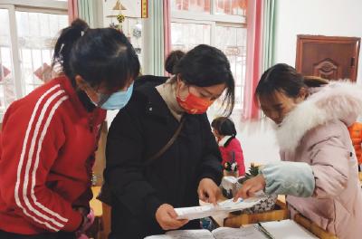 军店镇中心幼儿园：督导村级附属园促提升