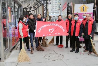 县教育局 开展人居环境整治扮靓包联小区“容颜”