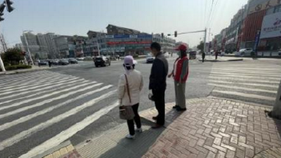 科协开展“雷锋月·学雷锋”文明劝导活动