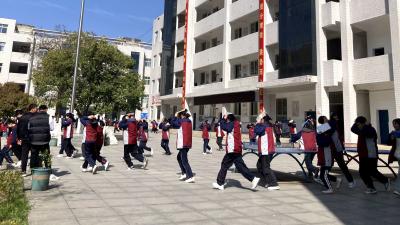 门古寺中学：开展“地震科普携手同行”避震疏散演练