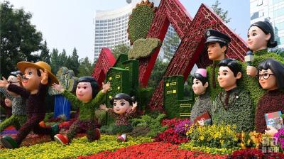 时政新闻眼丨在国庆招待会上，习近平强调“团结就是力量，信心赛过黄金”