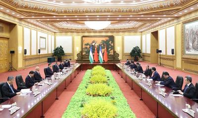 独家视频丨习近平同乌兹别克斯坦总统会谈：中乌友好这棵大树愈发根深叶茂 生机勃勃
