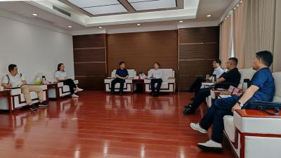 杨丹华与省城市地质工程院党委书记、院长王劲松一行座谈