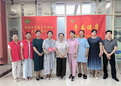 省计生协调研指导房县计生协工作