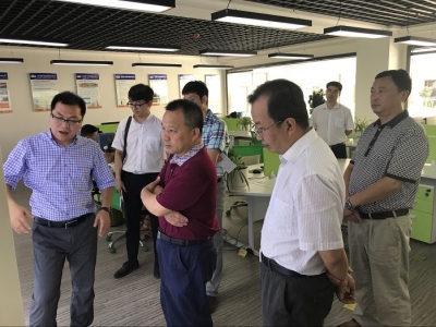 恩施州政协副主席谭建军赴州商务局调研督办重点提案