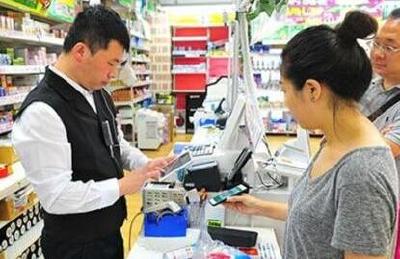 国人尽享无现金生活之便 二维码“扫”出社会新活力