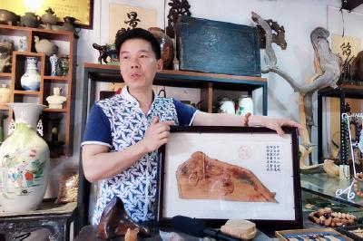 为逆行英雄雕像!郧西木雕艺人捐赠抗疫作品《战疫英雄》