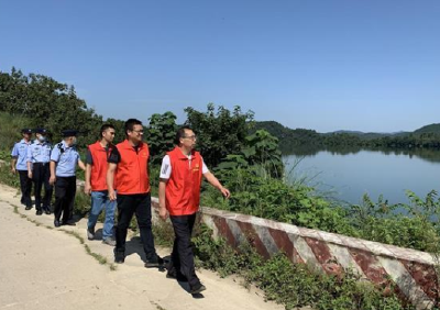 最高水位下的守库人 湖北日报记者探访十堰三地防汛护岸