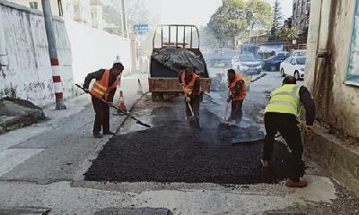 城区这四处路面被修好 再不怕晴天一身灰雨天一身泥了