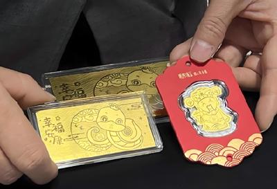 春节临近蛇“元素”金饰热销 小克重黄金贴片走俏市场