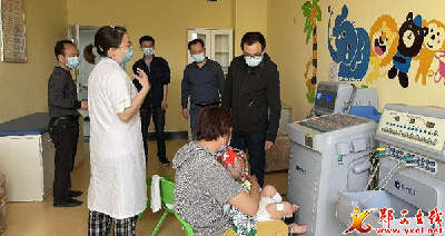县残联指导儿童定点康复机构业务