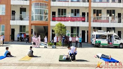 羊尾镇卫生院开展地震疏散避险和应急救援演练