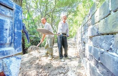 计划工期6个月 古城墙西城墙段进行人行道土方施工