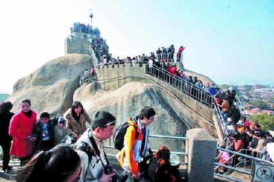 假日景区人满为患如何破？文旅部：继续推行门票预约制度