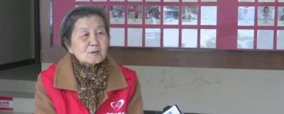 免费为社区服务，这面旗帜已在荆州飘扬了22年