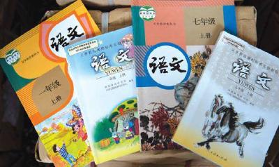 家长到校领取、教师送书、邮寄快递……荆州中小学教科书这样发