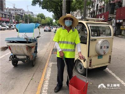 高温下的劳动者：挥汗如雨的“城市美容师”