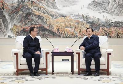 王忠林与北京大学党委书记郝平座谈 