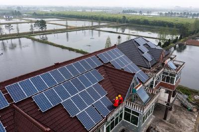 中国开展屋顶上的“绿色战役”应对气候变化