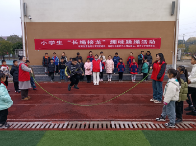 新时代文明实践丨荆州区白龙社区开展小学生“长绳接龙”趣味跳绳活动