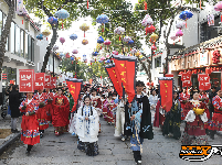 我们的节日·春节丨“CP出圈  共创荆彩”古城宾阳楼贺岁巡游喜庆又热闹