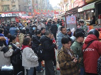 【图集】新春走基层|美食街烟火气年味浓