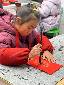 【全民写春联】红星路小学李雨瞳：童心挥毫，笔墨贺新年