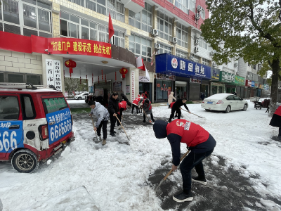 石首市自然资源和规划局开展除冰铲雪志愿服务活动