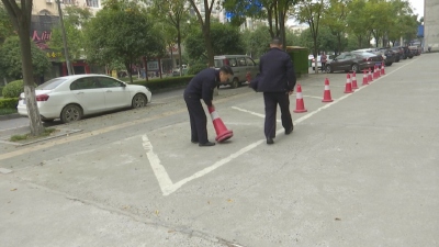 公共停车位岂是商户“私家领地”
