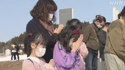 东日本大地震十周年：日本各地民众默哀一分钟悼念死难者
