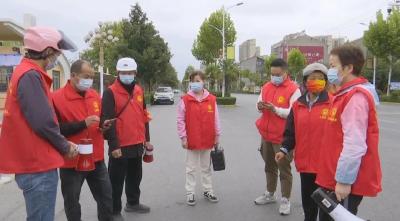200余名志愿者组成“防疫劝导队”