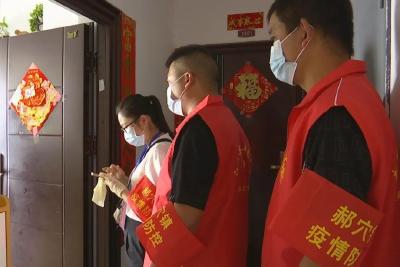 战疫前线“志愿红”