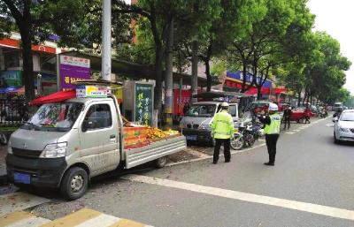 取缔“马路市场”还路于民